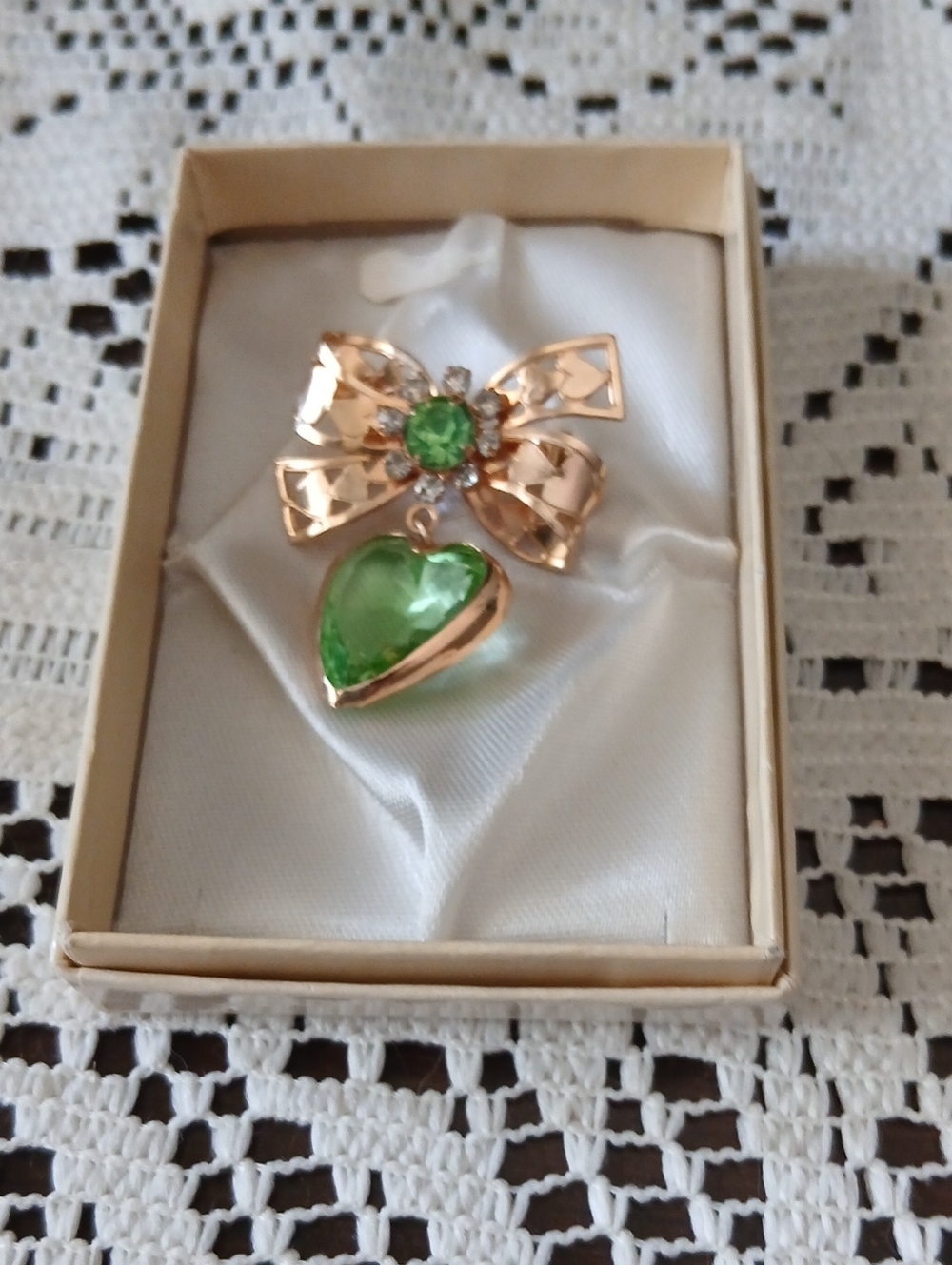 Gold-Tone Bow Pendant Necklace with Green Heart Gem